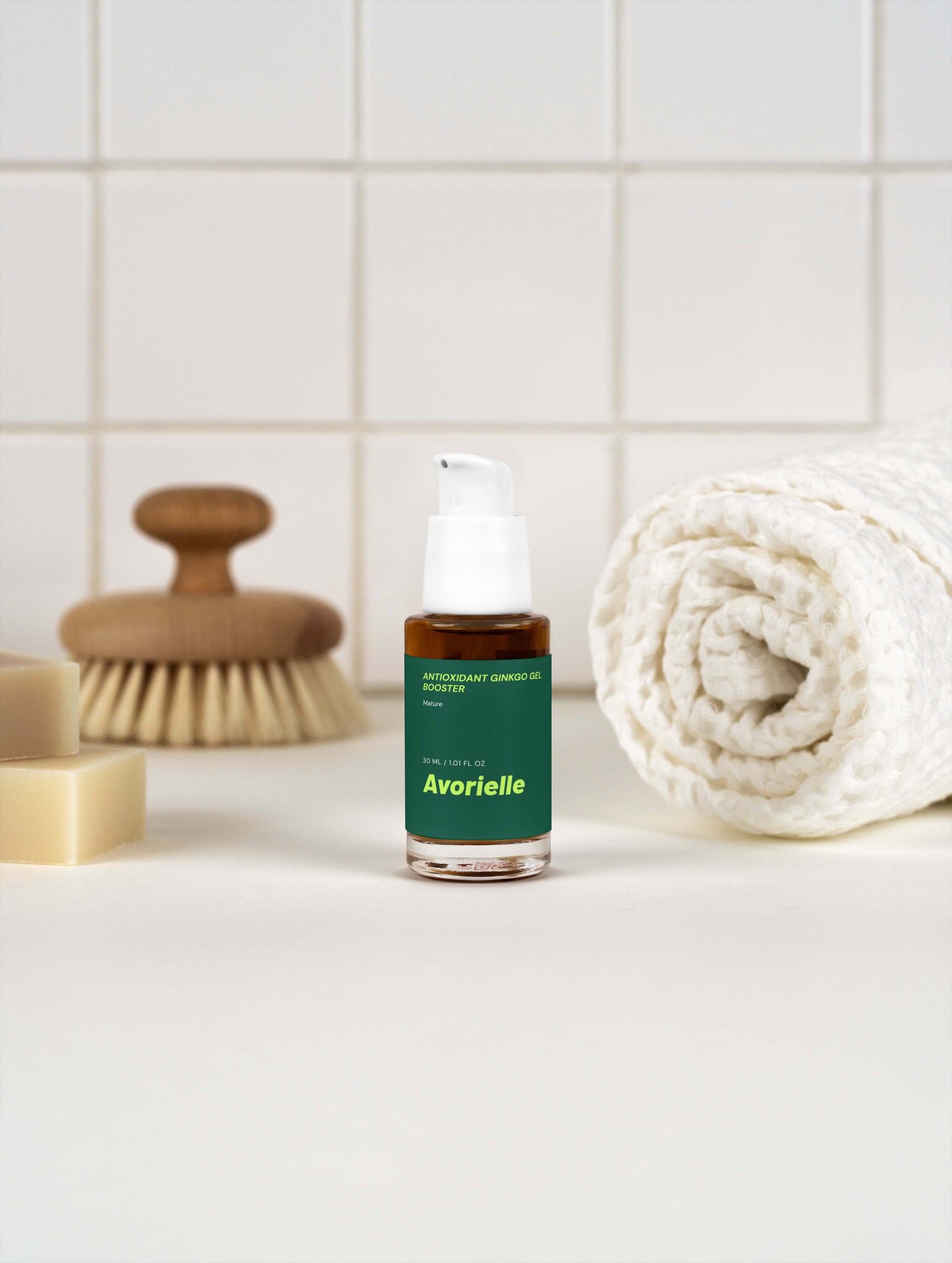 Antioxidant Ginkgo Gel Booster on a bathroom counter, promoting ginkgo gel antioxidant booster for youthful skin.